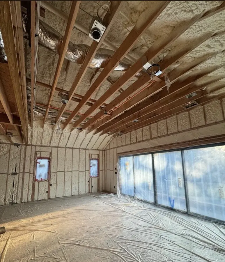 Interior walls and ceiling insulated with spray foam during new construction in Superior